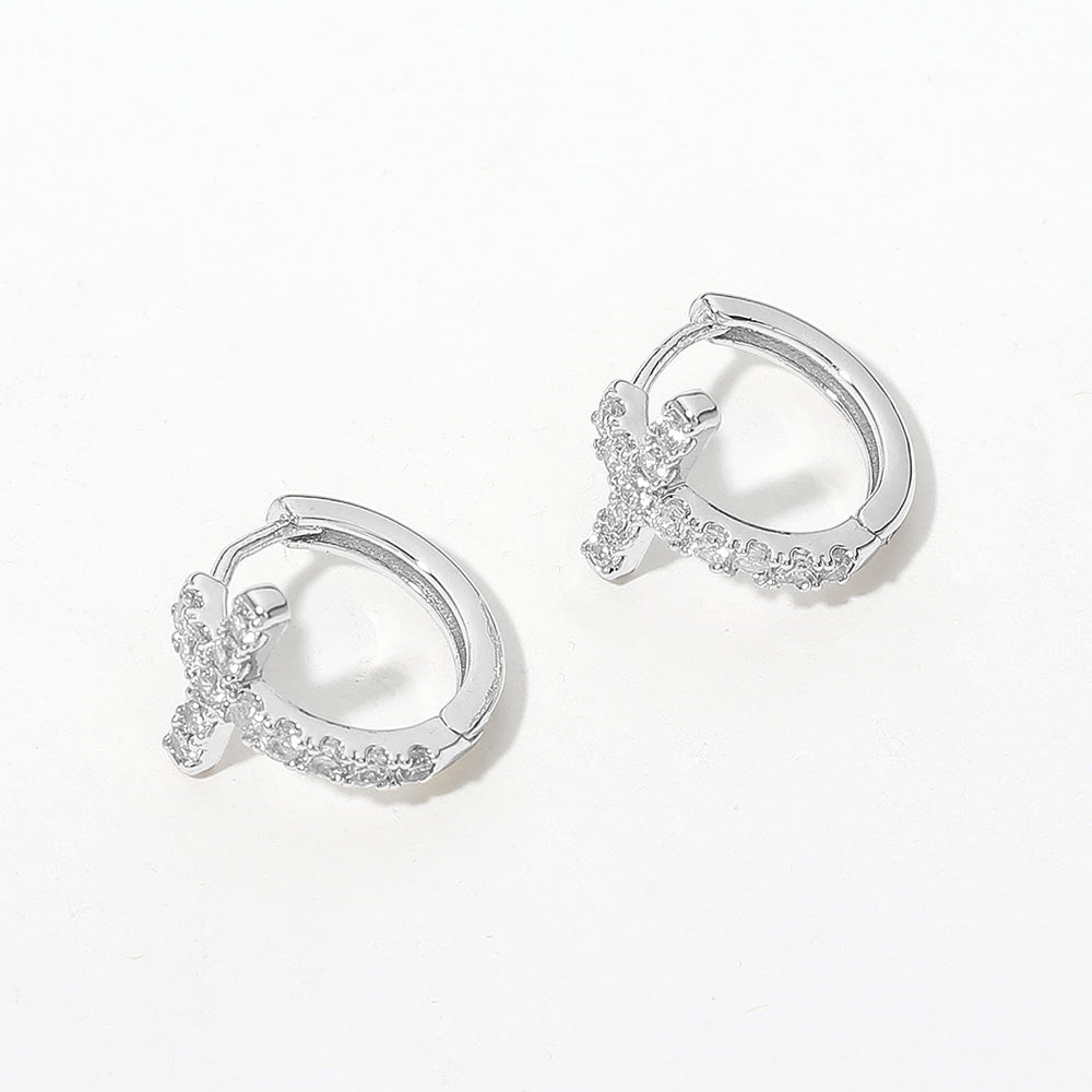 iLLASPARKZ White Gold Dipped CZ Stone Paved Cross Huggie Hoop Earrings