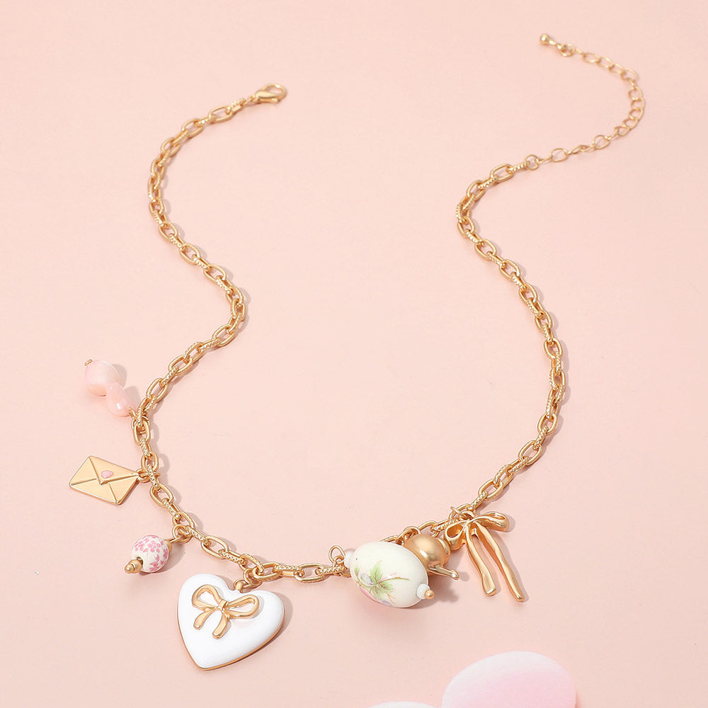 iLLASPARKZ Bow Heart Tea Party Charm Station Necklace
