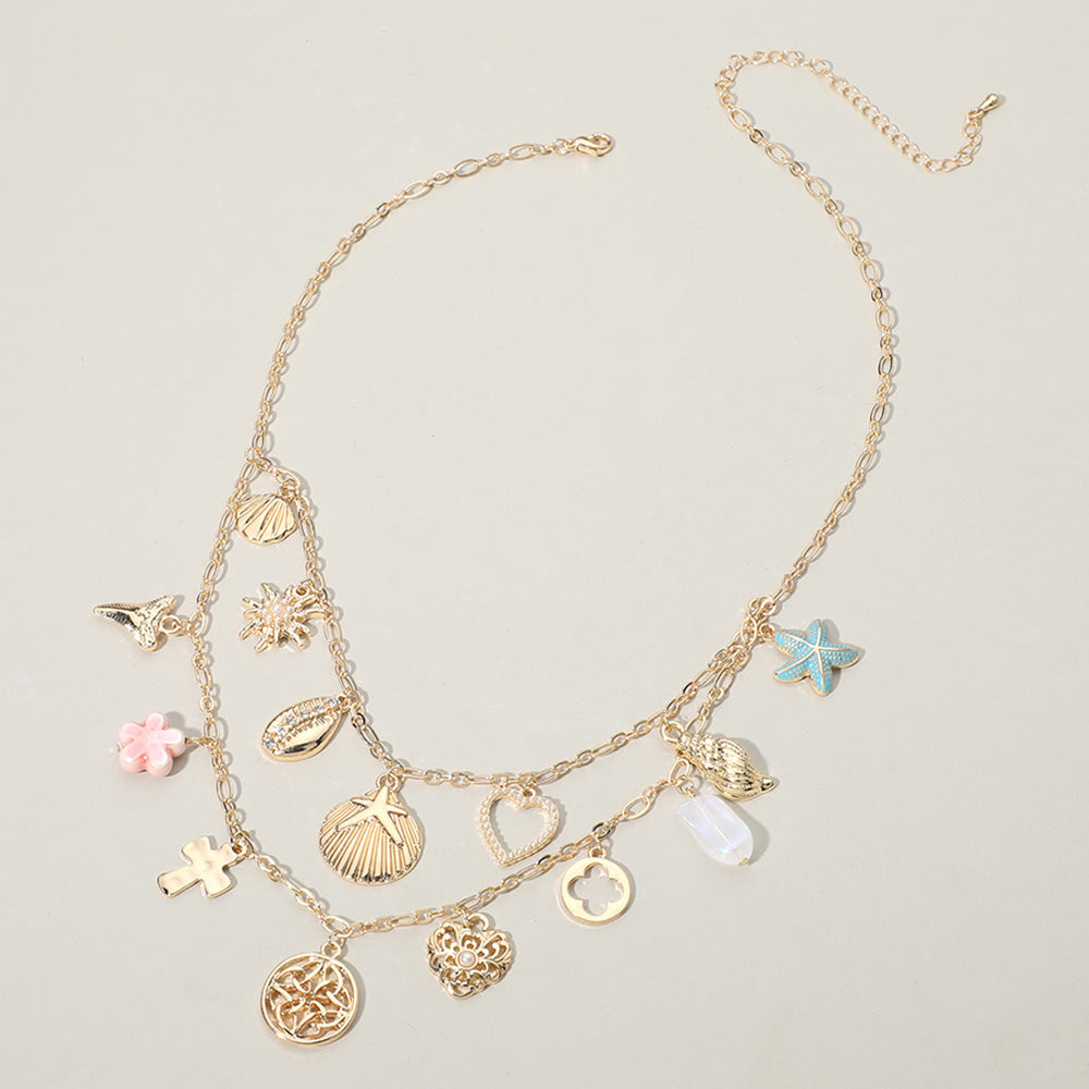 iLLASPARKZ Sea Shell Puka Shell Cross Quatrefoil Stone Pearl Heart Ceramic Flower Charm Station Double Layered Necklace