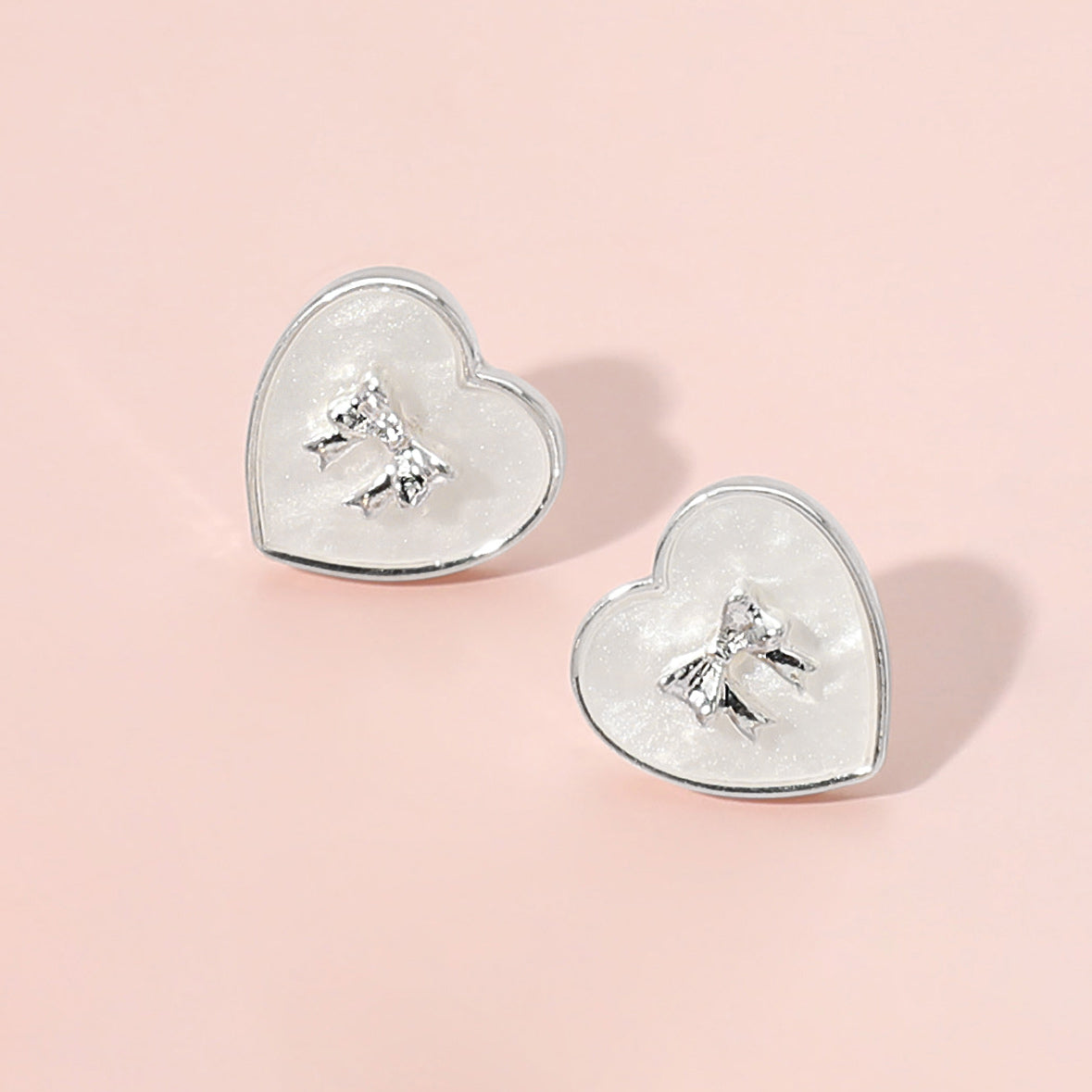 iLLASPARKZ Metal Bow Pointed Pearl Heart Stud Earrings